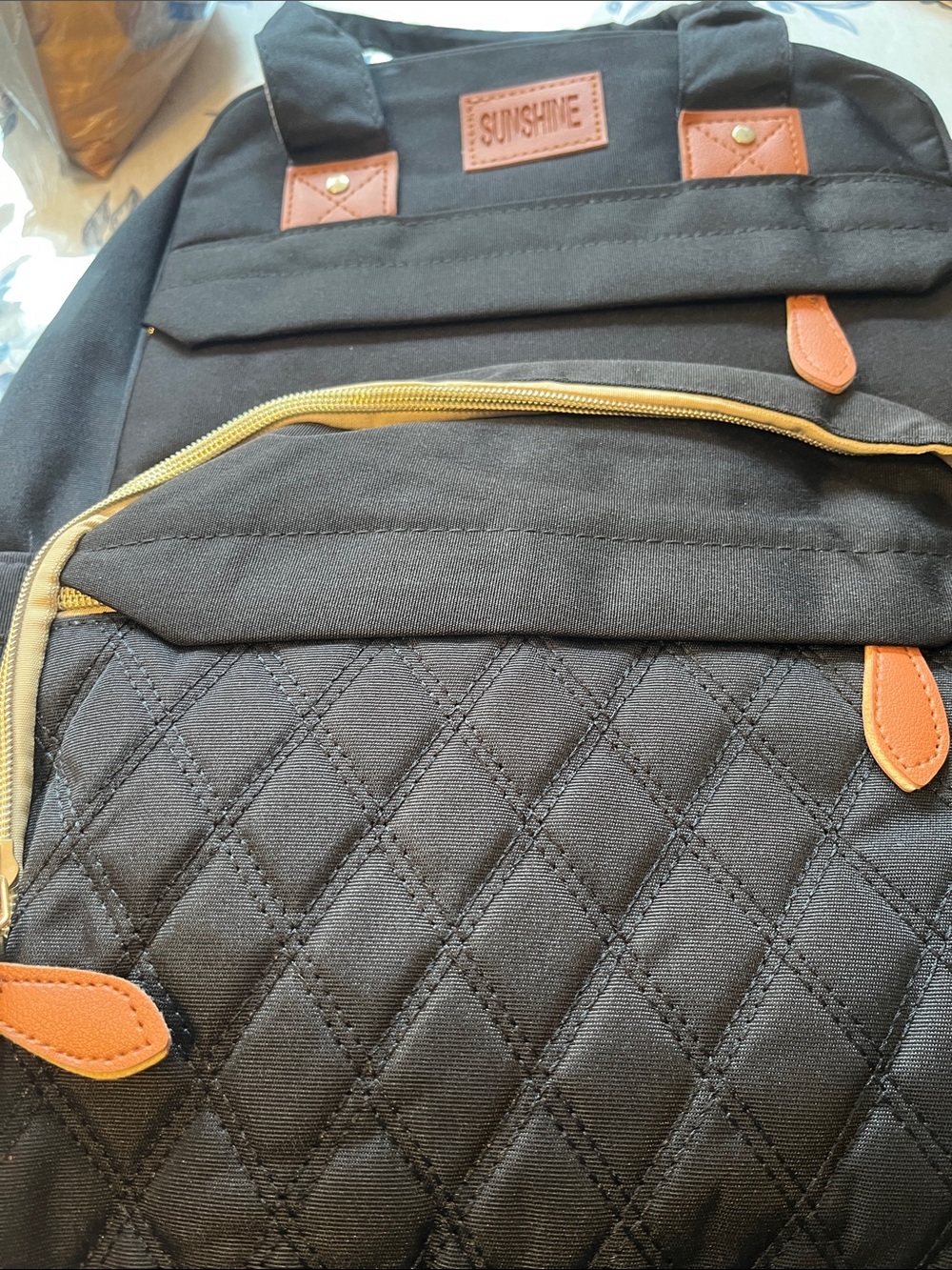 Quilted Black diaper bag.